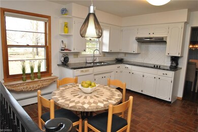 The kitchen is a nice size and has an eating area,