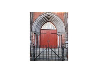 Facade/Exterior Front. From your stunning red arch