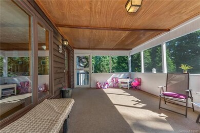 Upstairs screened in front porch