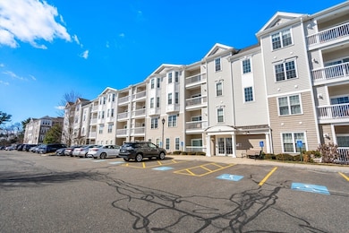 Wellington Crossing unit 401, Waltham, MA 02452 - photo 2