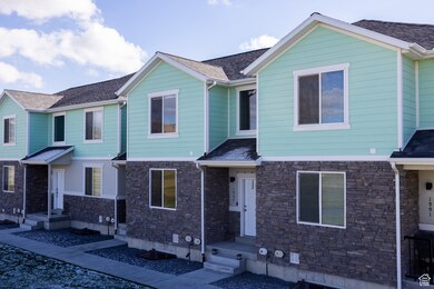 View of front of home featuring stone siding and a residential view