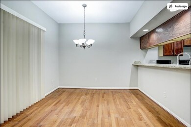 Rich hardwood floors run seamlessly through all li