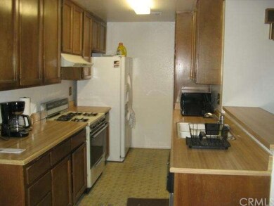 Kitchen with breakfast nook/counter.
