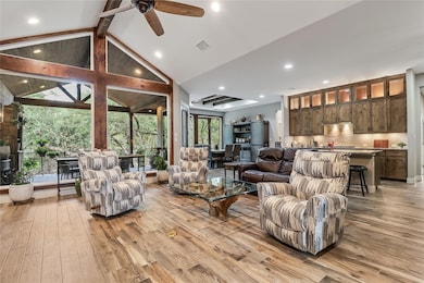 Living area featuring light wood finished floors 