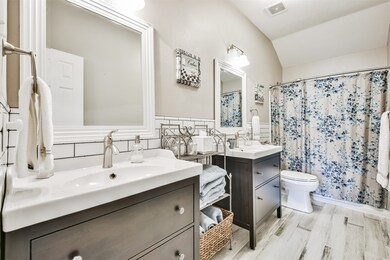 Recently updated secondary bathroom with double be