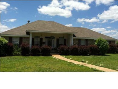 Located on a large corner lot.