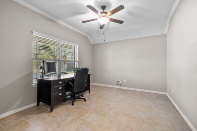 Immediately upon entering the home on the left side behind the french doors is the large office/study.