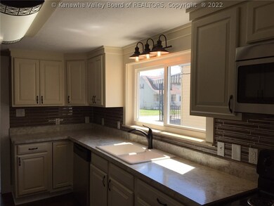 ANOTHER VIEW OF THE NEWLY RENOVATED KITCHEN