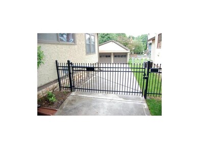 Private driveway with remote controlled entrance t
