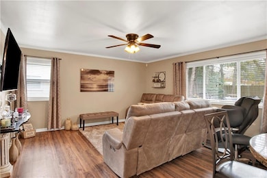 Living room featuring hardwood / wood-style floori
