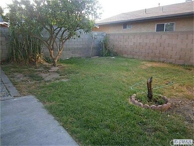 Private back yard with block wall surrounding