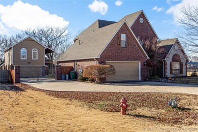 Attached 2-car garage and detached 2-car garage wi