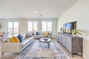 Living area with light wood-type flooring