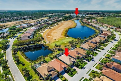 Aerial view featuring a residential view and a wat