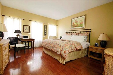 Spacious master bedroom has huge closet and window