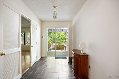 Slate foyer.  Bedroom 3 opening to left.