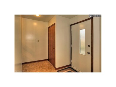 Lovely entry with guest closet.