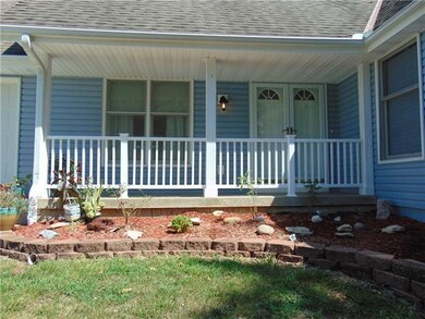 907 N Jackson St, Raymore, MO 64083 - photo 4