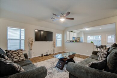 FAMILY VIEW LOOKING INTO KITCHEN