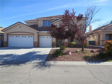 View of front of property featuring a tiled roof,