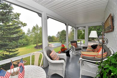 Side screened porch with door to the multi level d
