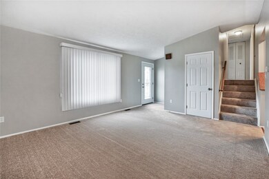 Plenty of natural light flows into the family room from the large bay window.
