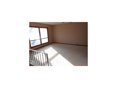 Family Room. Freshly painted and berber carpet alo