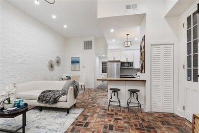 Open floor plan with high ceilings