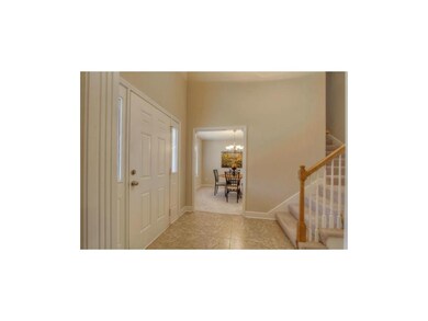 Two-story entry has tiled floors