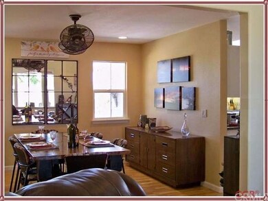 ANOTHER VIEW OF FORMAL DINING ROOM ADJACENT TO LIV