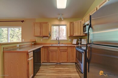 Kitchen Overlooks Beautiful Backyard