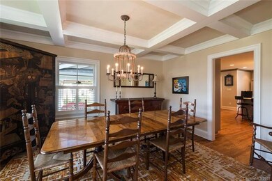 Dining room with coffered ceiling.