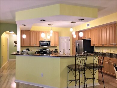 This wrap around breakfast bar can seat about 6 ch