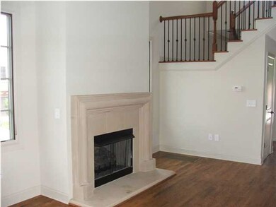 Great room with gas log fireplace.