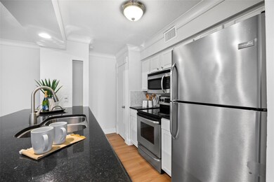 Kitchen featuring appliances with stainless steel 