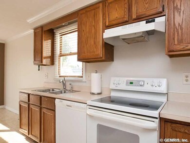 Kitchen. Eat-In Kitchen with Oak Cabinets Includes