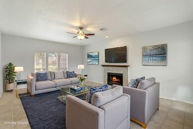 Downstairs features a circular, open layout that s