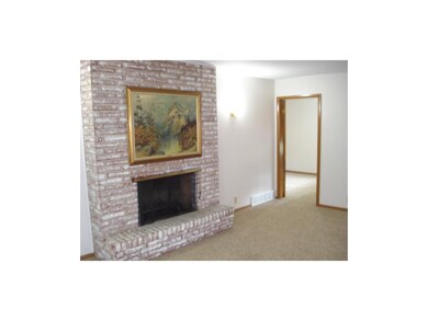 Front Living Room w/Fireplace and separate entranc