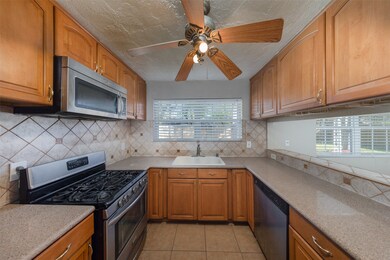 13914 Peatwood Rd, Houston, TX 77038 - photo 6