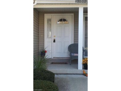 A charming front porch awaits you.