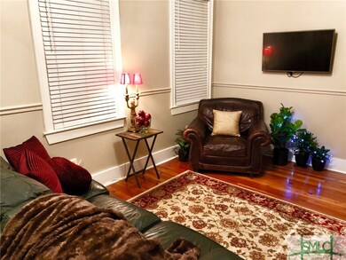 Living area. Note the beautiful hardwood floors.