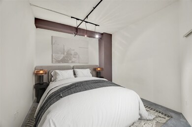 The larger of the 2 private Bedrooms at approximat