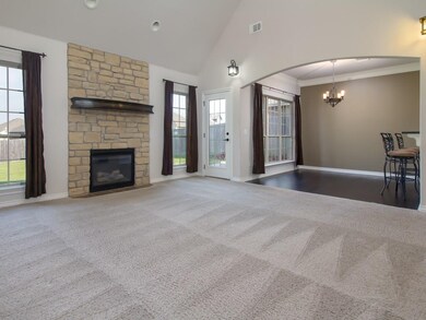 Stone Fireplace is focal point of living.