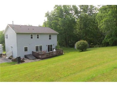 Exterior Back. Back view of the house showing deck