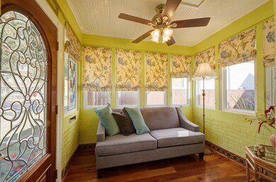 Front Door foyer, great reading/tea room 3 windows