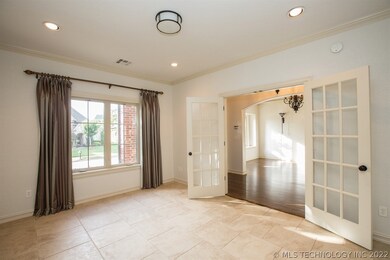 French doors, designer drapes, tile floor, walk in