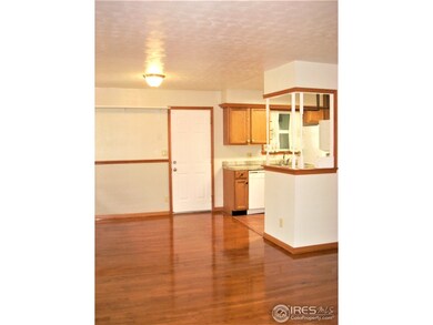 Living Room Looking To Dining Area