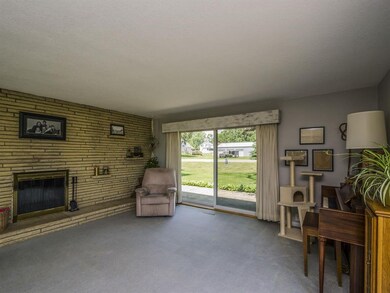 Wood burning fireplace in living room