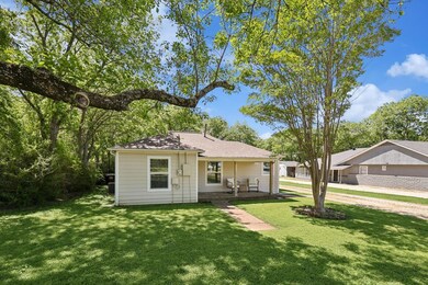 View of front of property with a front lawn