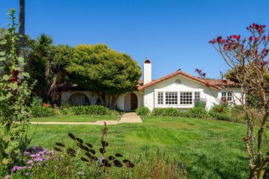 Front entrance with lush landscaping